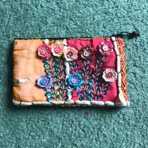 Floral sequined clutch